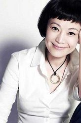 洪梁玉（张艾嘉饰演）
