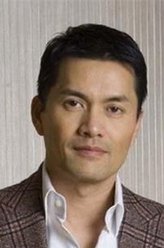 李国华（吕良伟饰演）