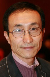 李光明（巩汉林饰演）